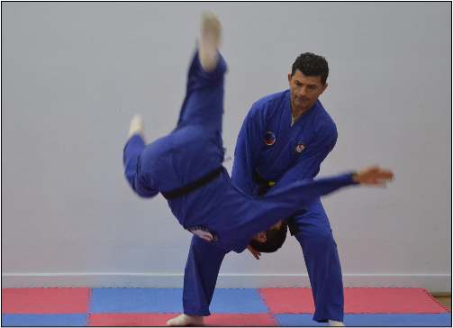 Master showing hand throw